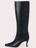 Women's square toe ankle cowboy boots in various colours on a neutral background.