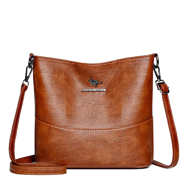 Women's soft leather shoulder bag in bucket design with large capacity and internal phone pocket