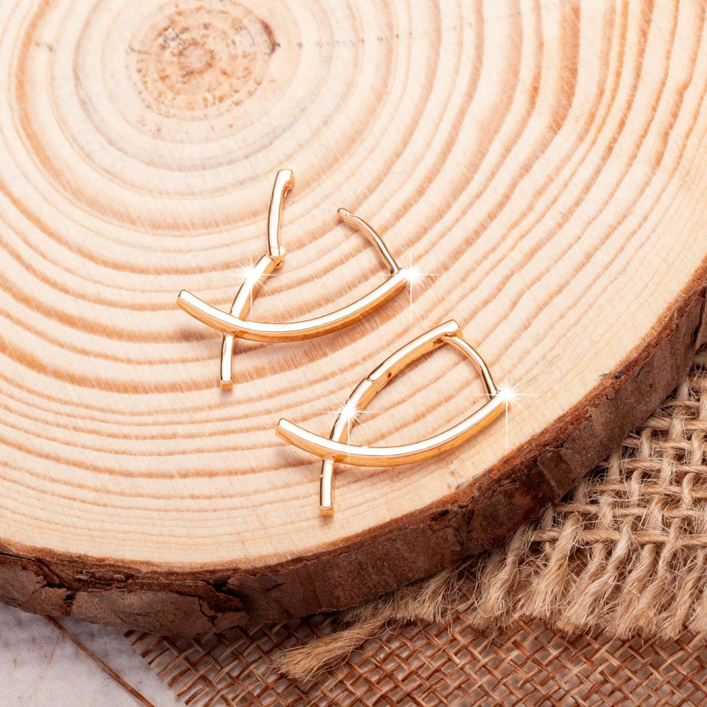 Rose gold cross shaped earrings on copper base with light luxury finish