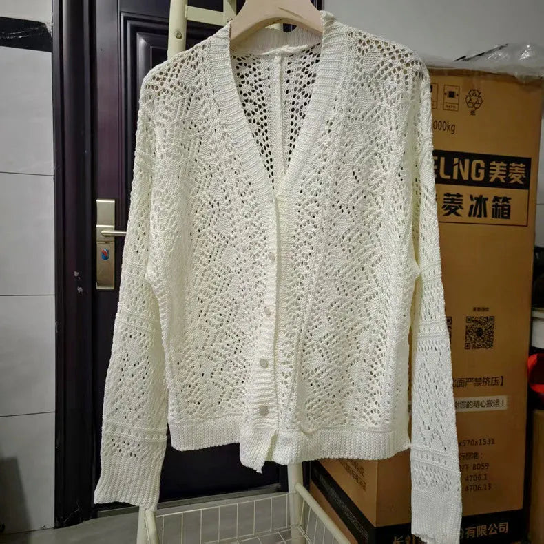 Beige hollow-out knitted two-piece skirt set with long sleeve top, mid-length skirt and belt
