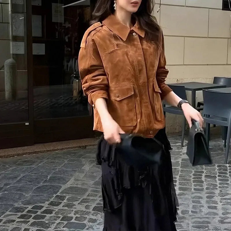 Women's brown suede coat with regular sleeves on hanger