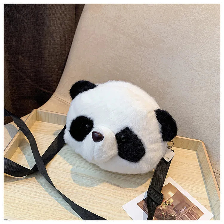 Plush panda head design crossbody bag showing cylindrical shape and sandwich pocket