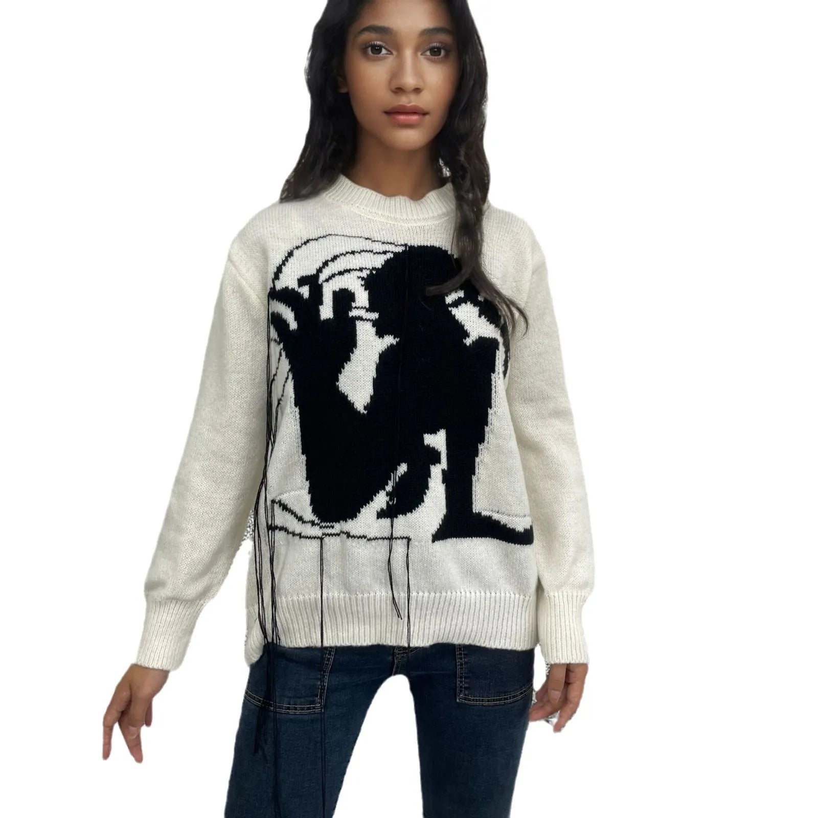 Women's grey alpaca wool sweater with tassel detailing and abstract pattern