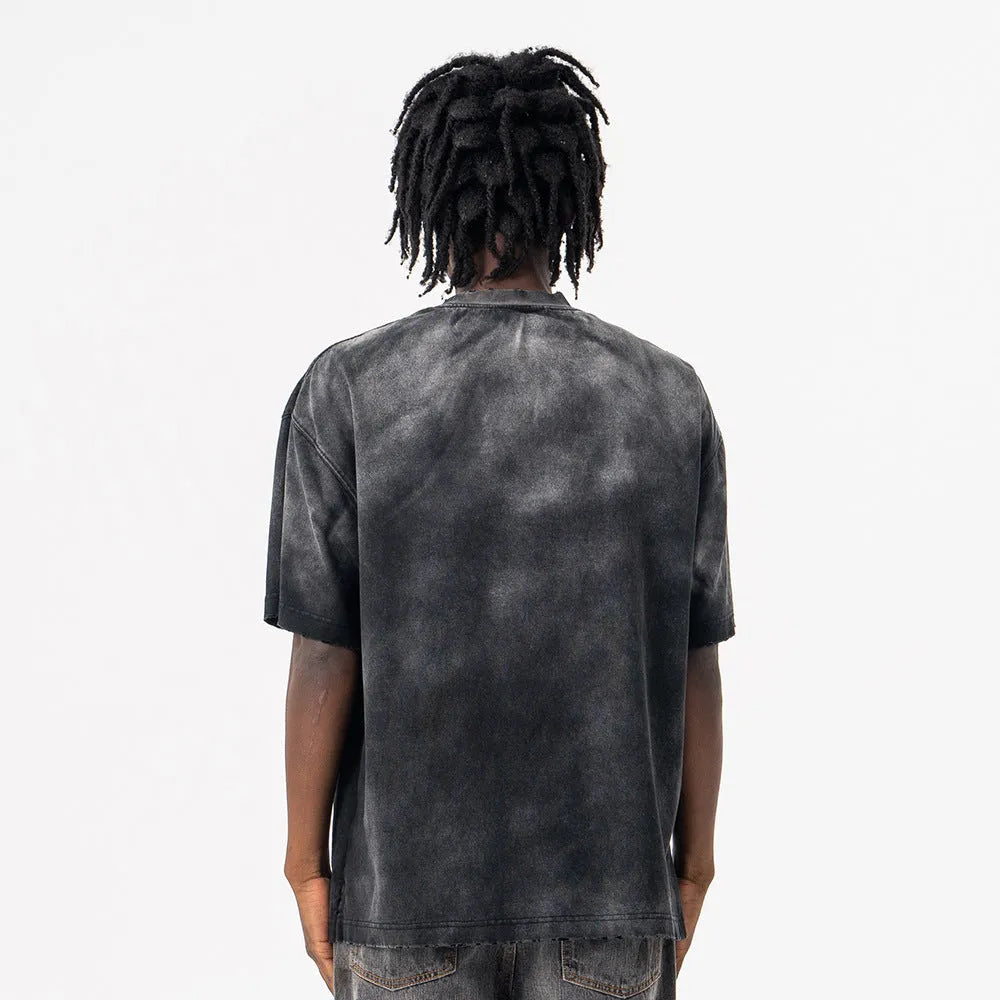 Men's black loose cotton t-shirt with printed letters and drop-shoulder short sleeves.