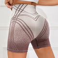 Women's high-waisted gradient fitness shorts in nylon-blend fabric with removable lining