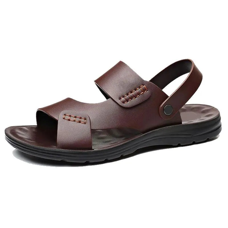Men's brown and black waterproof plastic casual sandals on a beach background.
