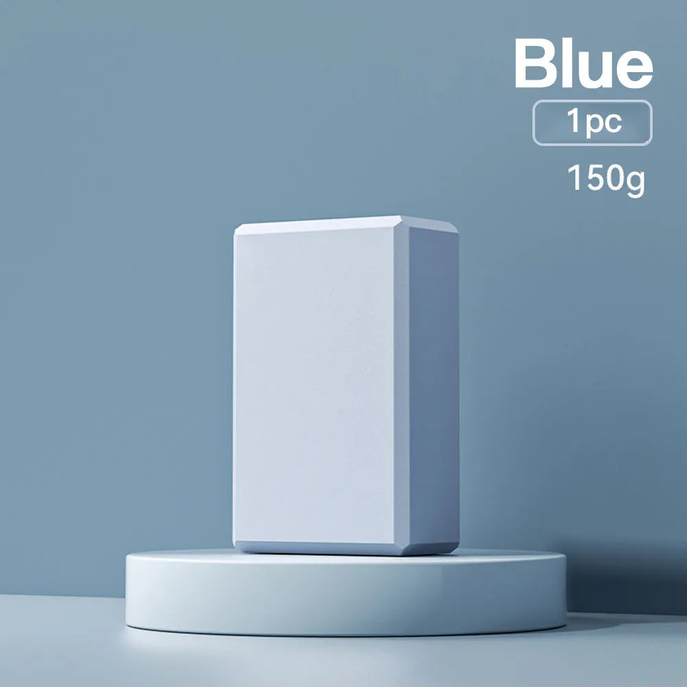EVA foam yoga blocks in four colours showing hexagonal facets and ridge grip details
