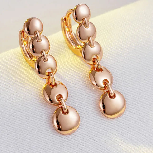 Gold retro woven copper circle earrings with round shape and long drop design
