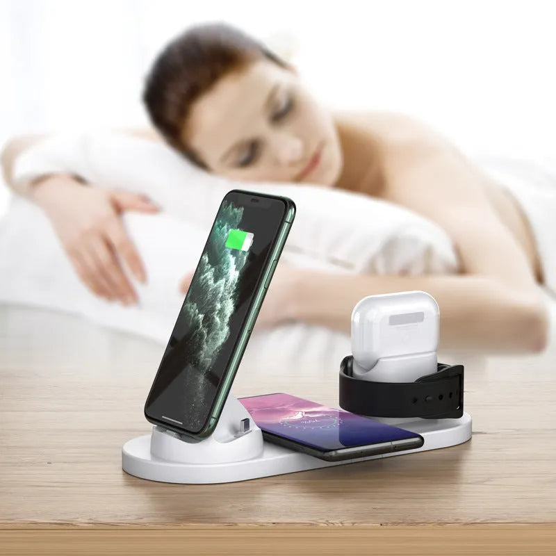 Black or white 6-in-1 wireless charging station holding phone with AirPods and watch charging