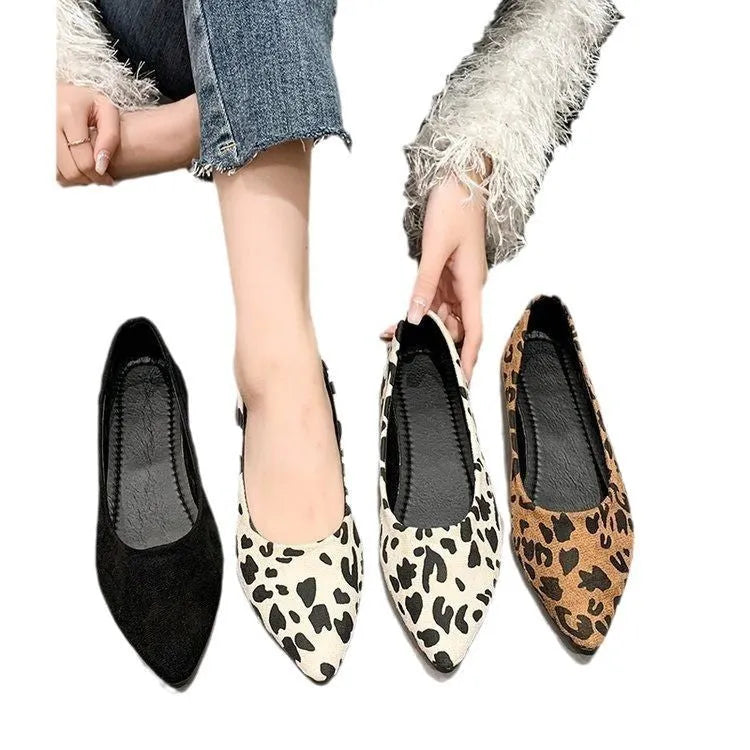 Women's leopard print pointed toe flat pumps with low heel on white background