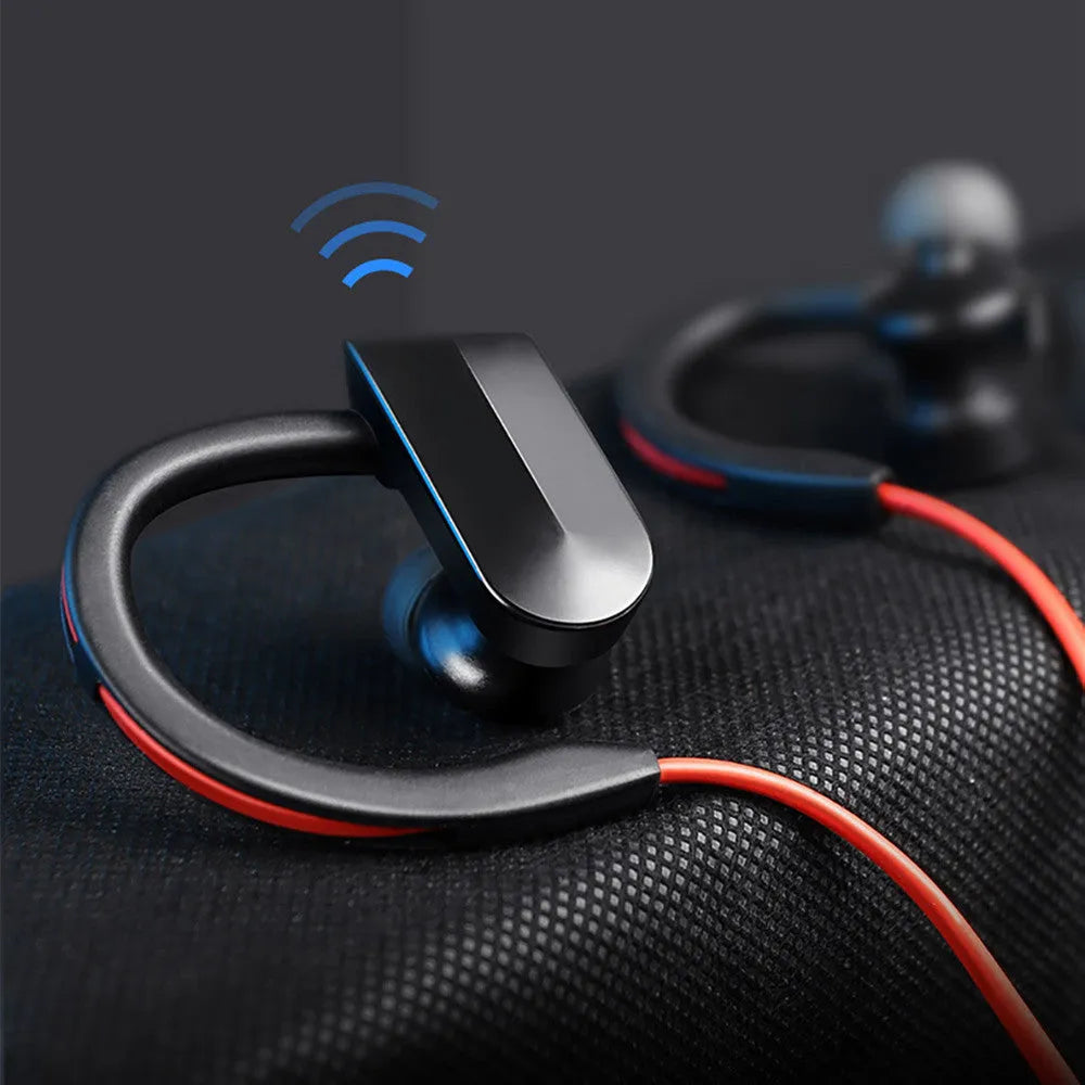 Wireless neckband Bluetooth earphones in black, blue, or red colours with USB charging cable.