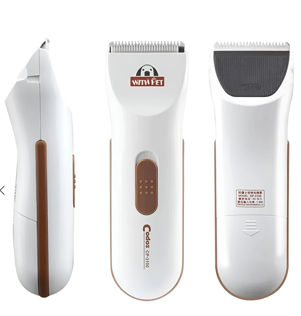 White electric pet hair clipper with ceramic blade on a table
