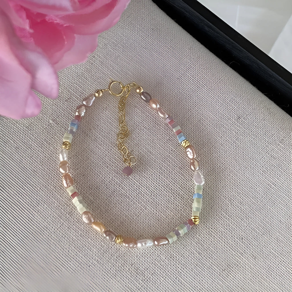 Women's 14K gilded purple silver natural pearl bracelet and necklace set showing irregular mini pearls