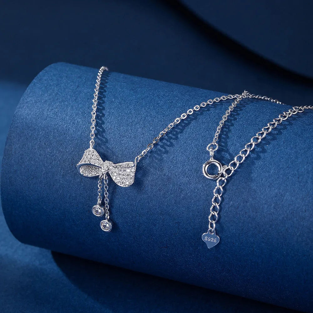 S925 sterling silver necklace with bow pendant on adjustable 40-45cm O-ring chain