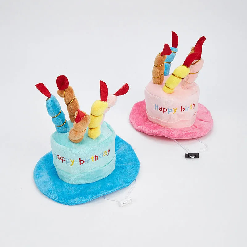 Blue and pink dog birthday hat shown with dimensions 21cm long by 15cm wide