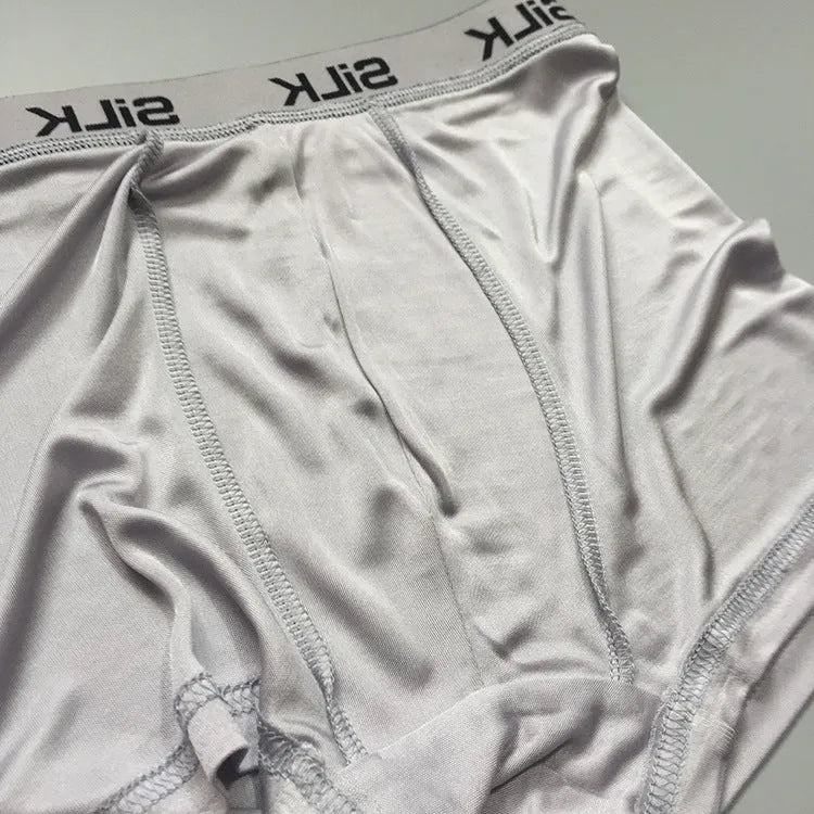 Men's loose-fitting silk shorts in navy blue colour with mid-waist design