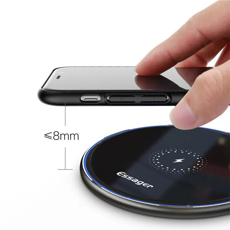Black 15W fast wireless charging pad with anti-slip surface and LED light, measuring 10.1cm by 7cm
