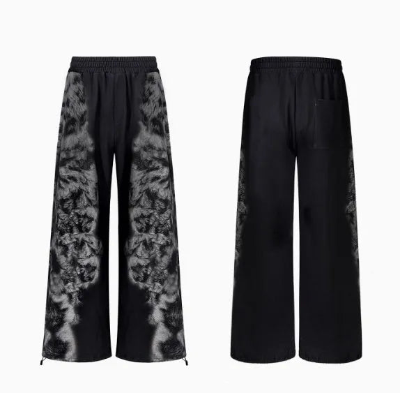 Printed loose fit trouser set including trousers, hoodie, and seven-inch shorts with collage stitching details
