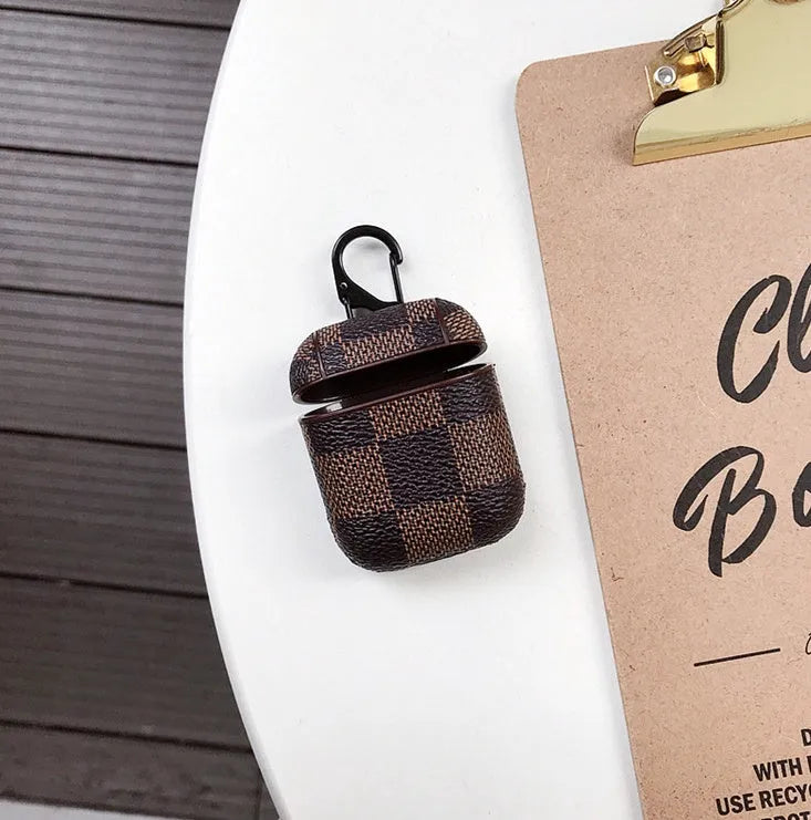 iPhone XS MAX plastic hard shell case with lattice design and an anti-lost hook for a Bluetooth headset.