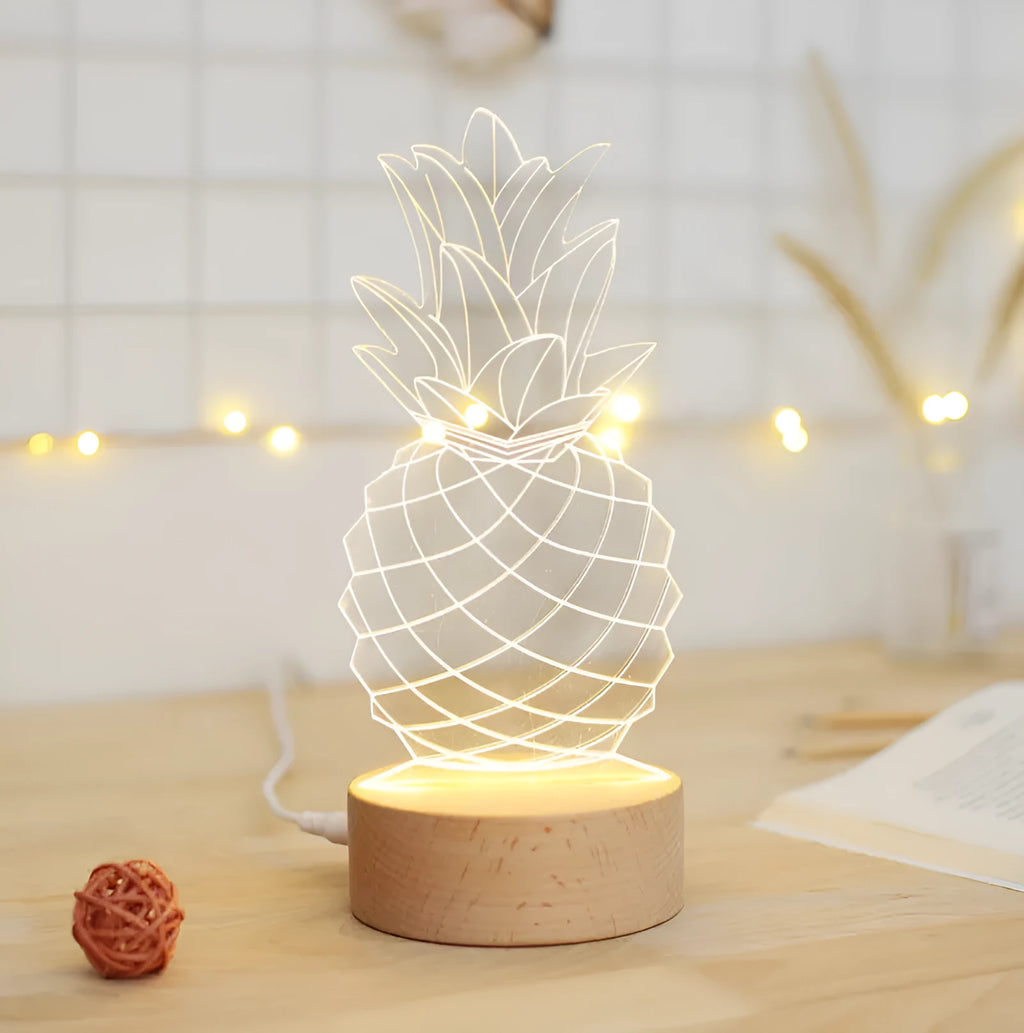 Pineapple-shaped cartoon night light with wood base and acrylic elements on bedside table