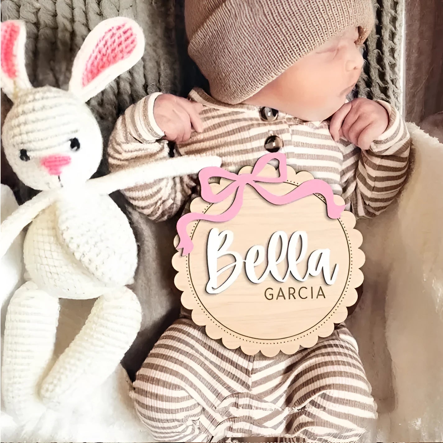 Square wooden baby room ornament with customised name engraving, shown in two size options.