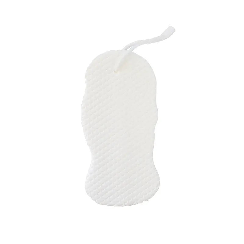 White 3D fish scale pattern bath sponge ball with hanging loop on a grey background.