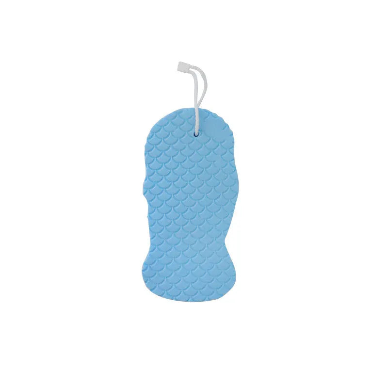 White 3D fish scale pattern bath sponge ball with hanging loop on a grey background.