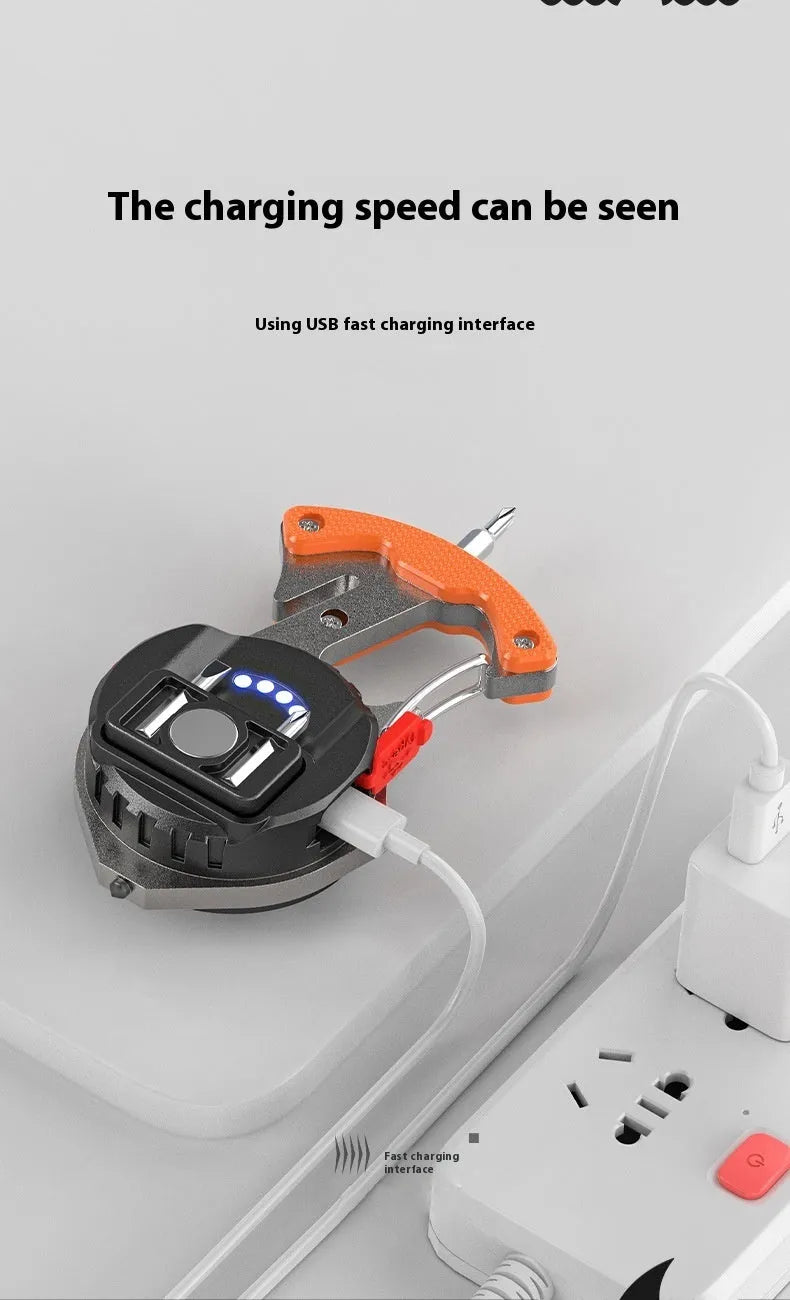 Silver and black multifunctional keychain light with LED array, window breaking hammer tip, and screwdriver.
