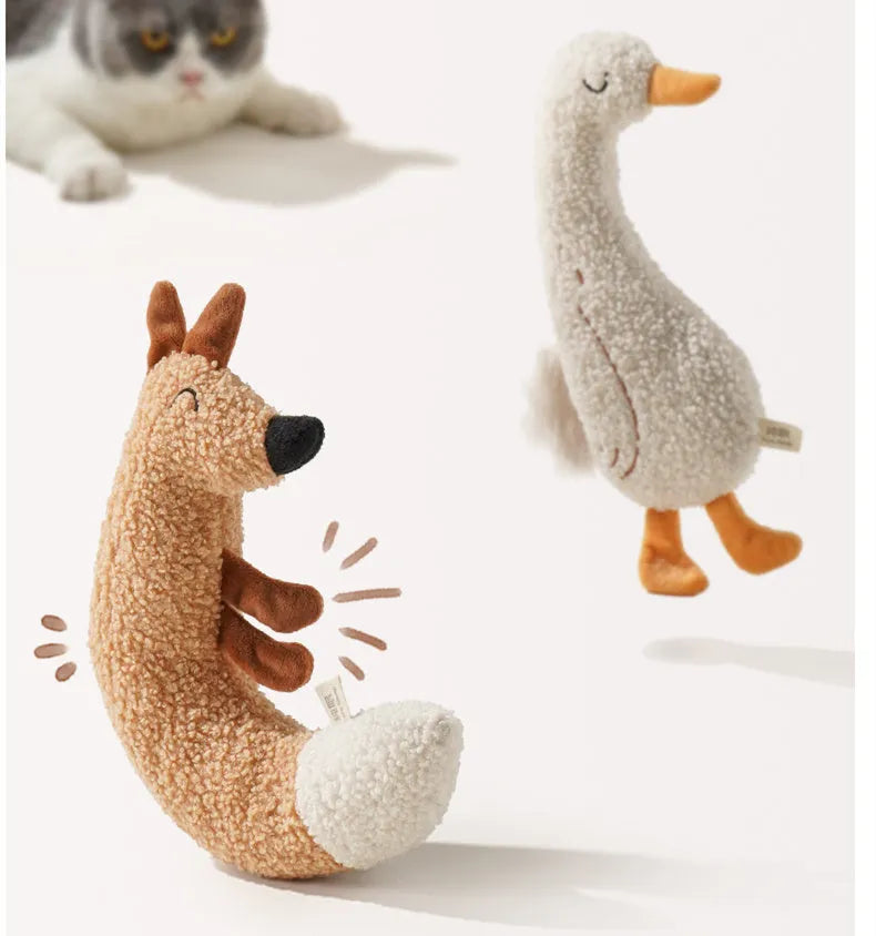 Cartoon dog chew toy in teddy velvet fabric, shown as a duckling and a fox character on a white background.