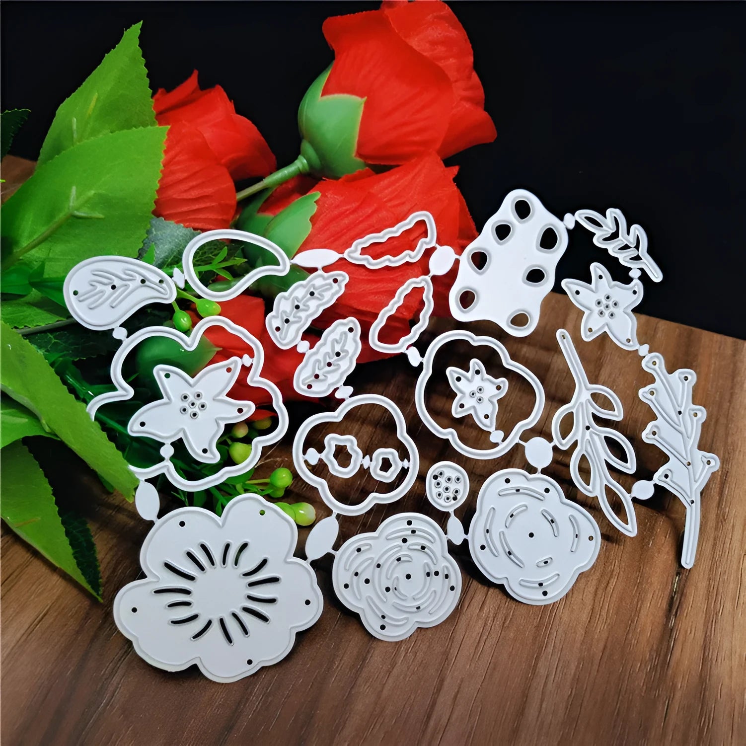 Silver carbon steel flower knife mould for paper cutting measuring 14.3 by 9.9 centimetres