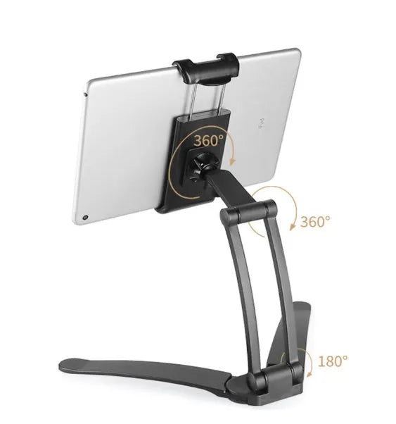 Silver aluminium alloy desktop stand holding a tablet, showing its adjustable clip and mounting base.
