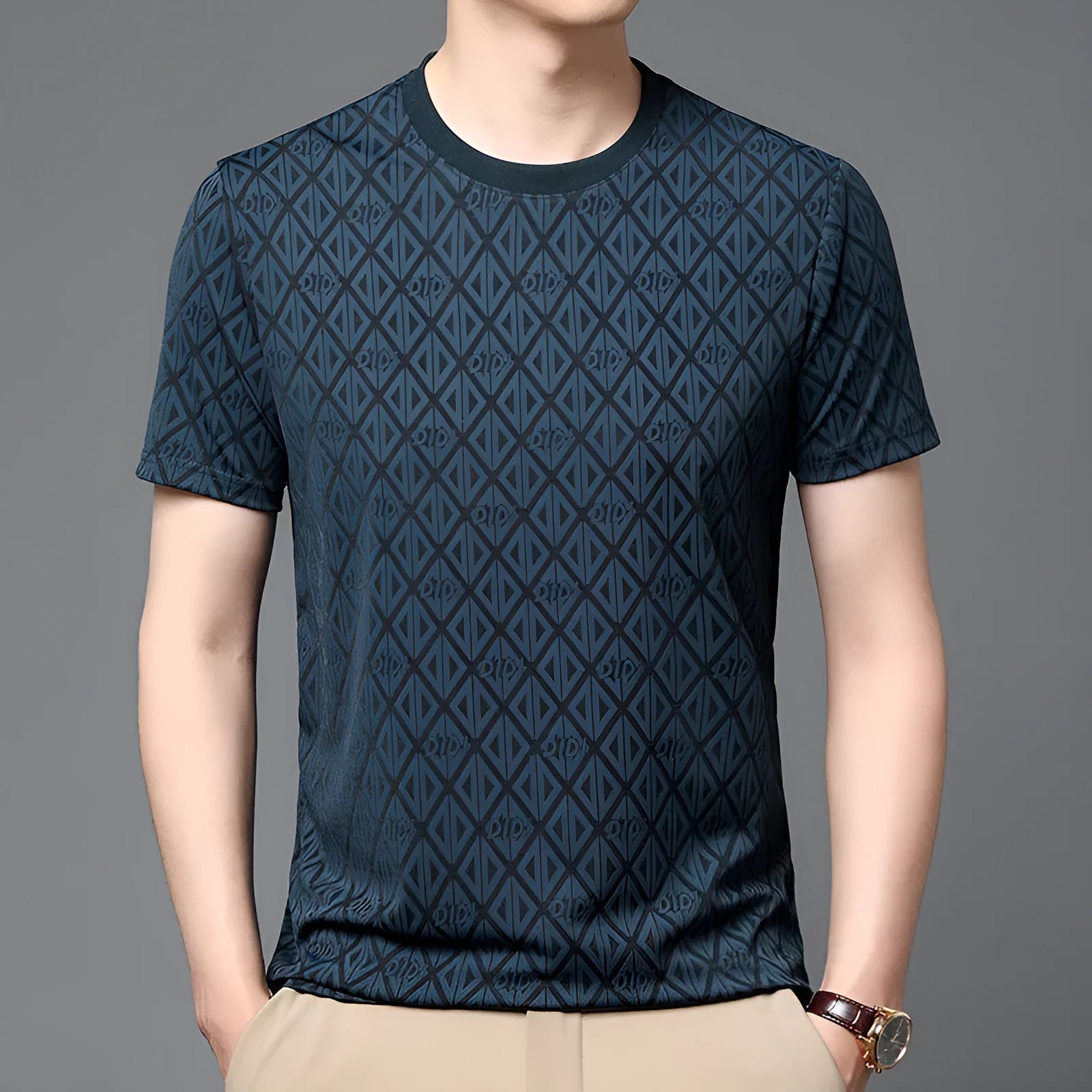 Man wearing a loose fit black Jacquard short sleeve T-shirt with a round neckline.