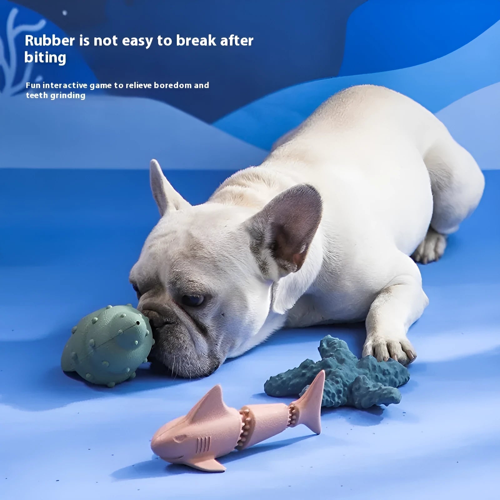 Deep sea shark rubber dog toy in blue or green colour options for pet chewing and play.