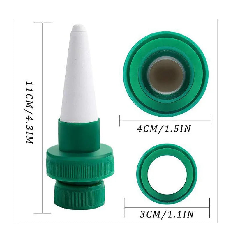 Green ceramic plant watering dripper attached to cola bottle for automatic irrigation