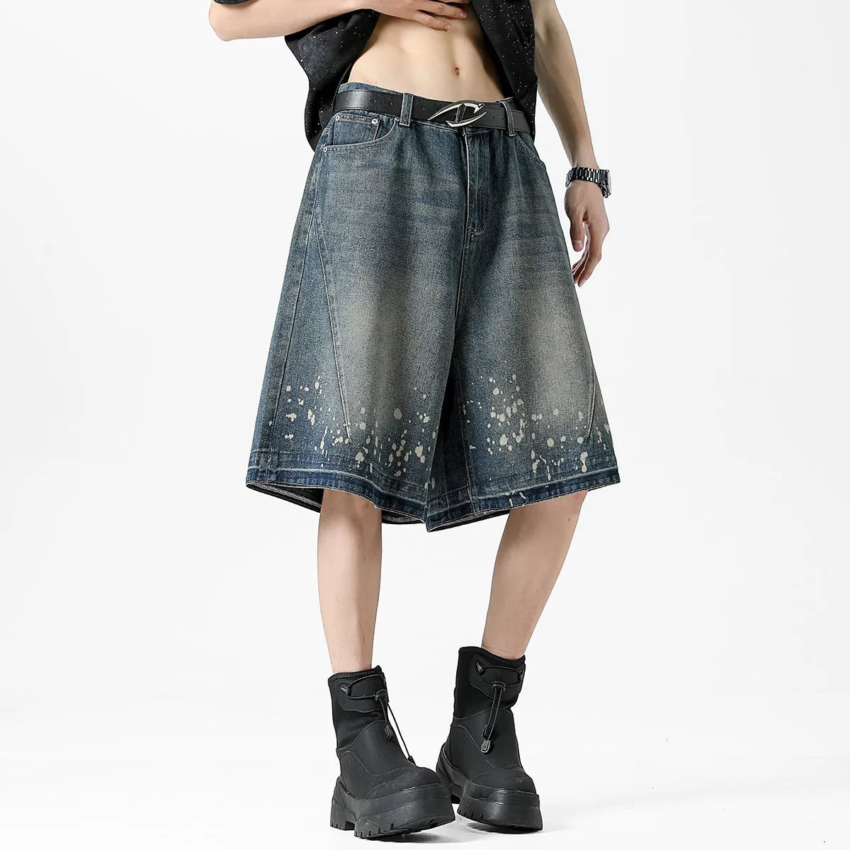 Men's retro blue denim shorts with ripped detailing and splash ink patterns on straight leg cut