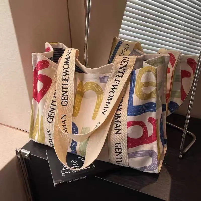 Large canvas tote bag with printing decoration in shoulder bag style
