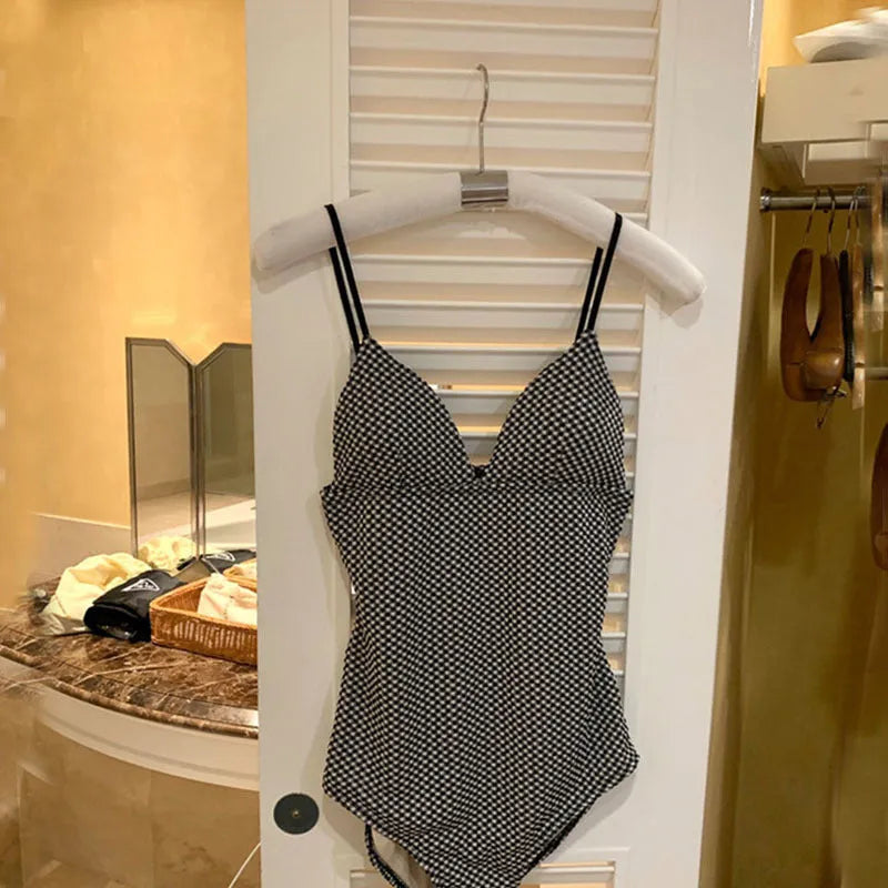Women's black or blue one-piece swimsuit for hot springs with chest and stomach coverage
