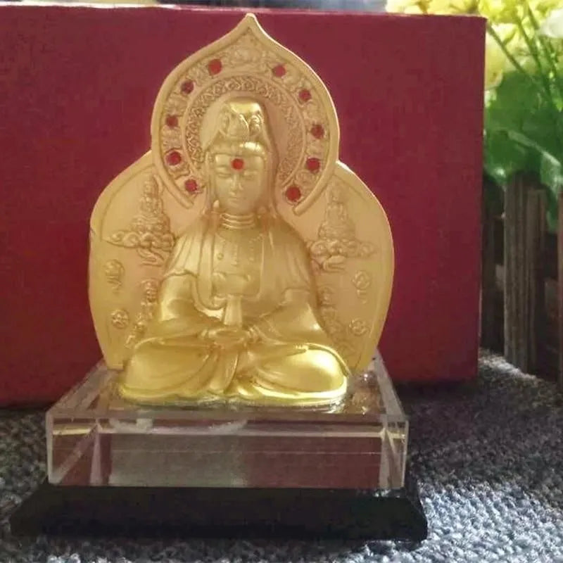 Traditional Chinese style alloy prayer wheel car decoration on a dashboard.