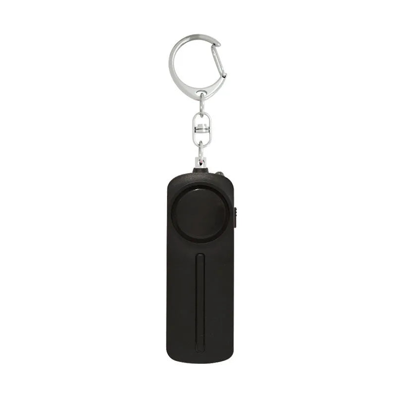 Compact pink personal safety alarm with keychain attachment showing dimensions 86x30x20mm