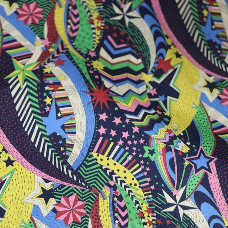 Blue cotton fabric with a detailed digital print of plants and flowers, showing a 1m x 1.45m piece.