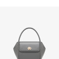 Women's leather cross-body wing bag with buckle closure in four colour options