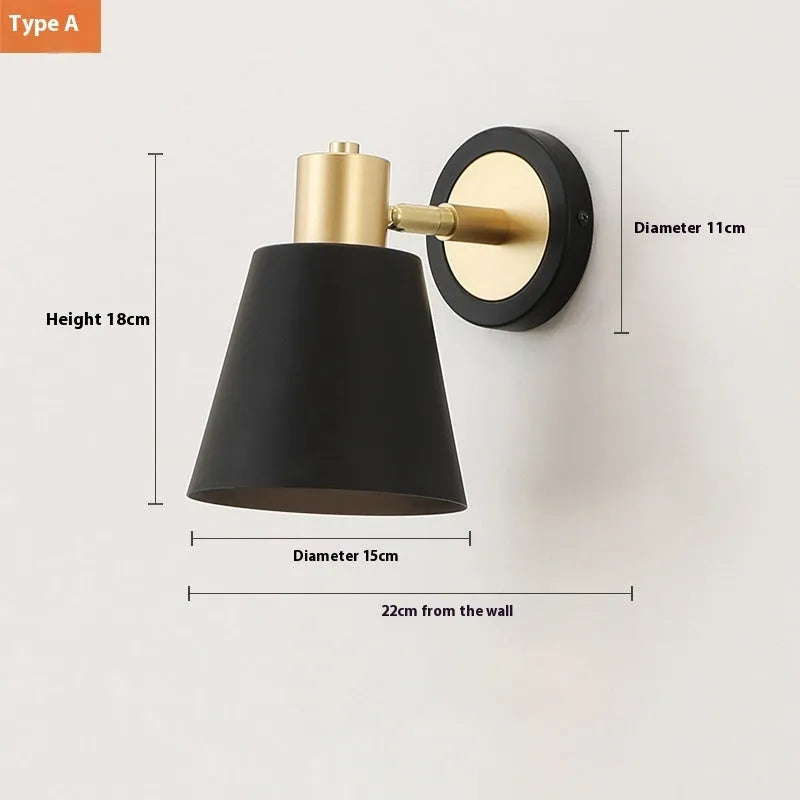 Nordic style iron wall lamp mounted beside a bed, showcasing its metal construction and adjustable light settings.