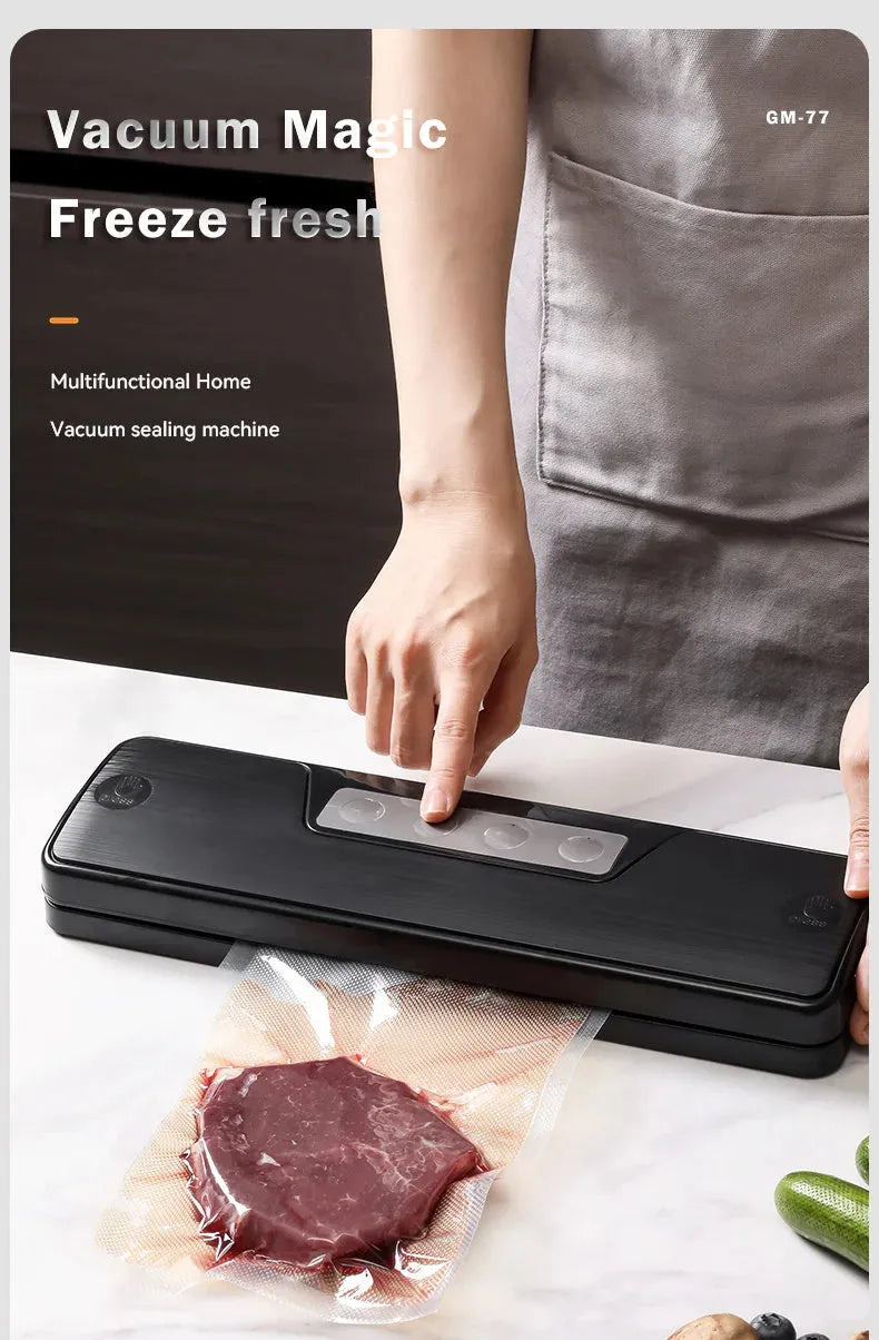 Small white automatic vacuum sealing machine for home food preservation on a kitchen counter.