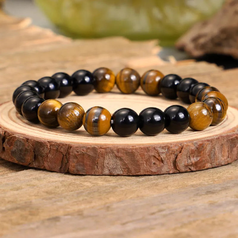 Tiger eye stone convertible tassel chain showing 81cm length and ball bead construction