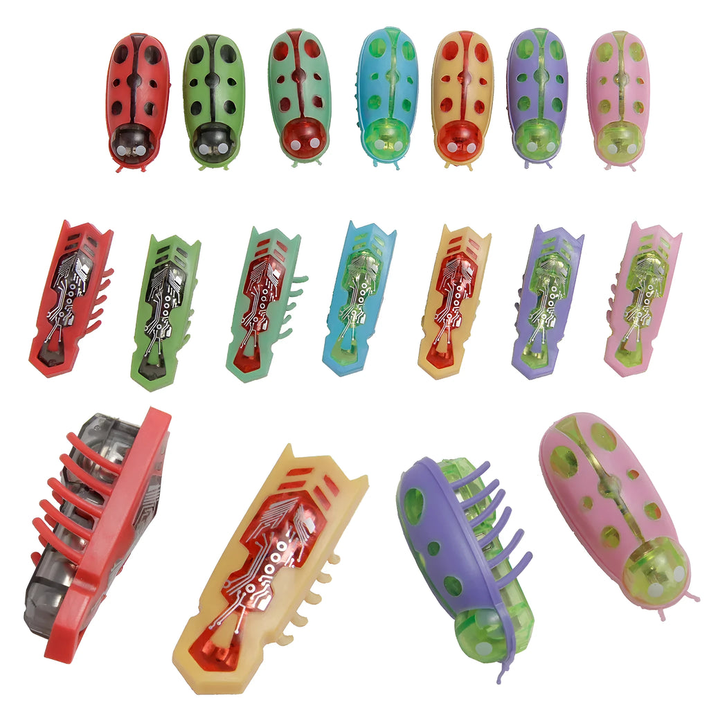 Small red ladybird-shaped electric cat toy with multiple legs on a hardwood floor