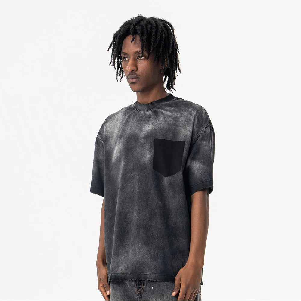 Men's black loose cotton t-shirt with printed letters and drop-shoulder short sleeves.