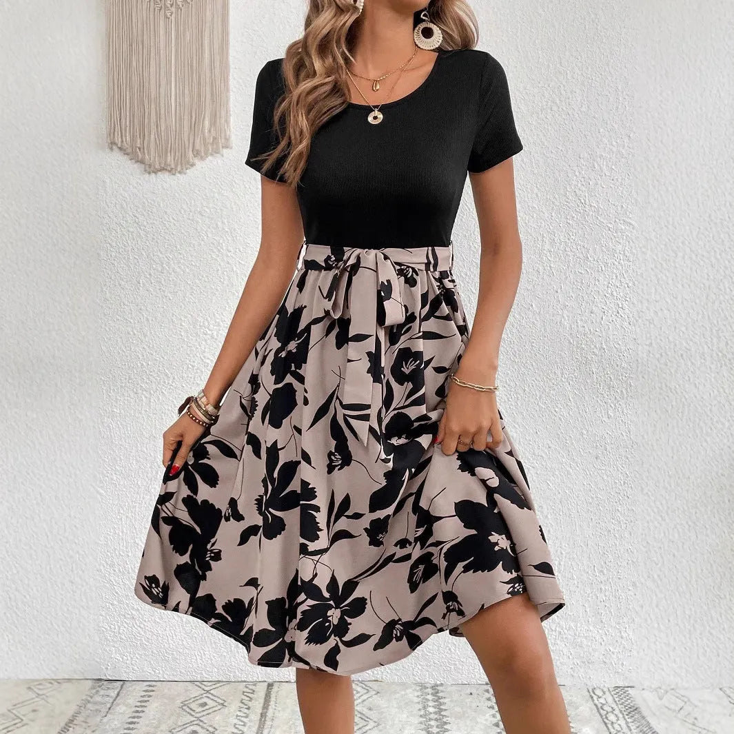 Women's casual dress with plant and flower printing pattern, lace-up details, and shoulder straps