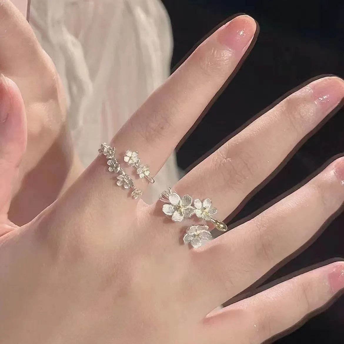 Adjustable open mouth ring with three-dimensional jasmine flower design and electroplated finish
