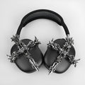 Gothic cross design hard resin cover for Apple AirPods Max headphones in gunmetal colour.