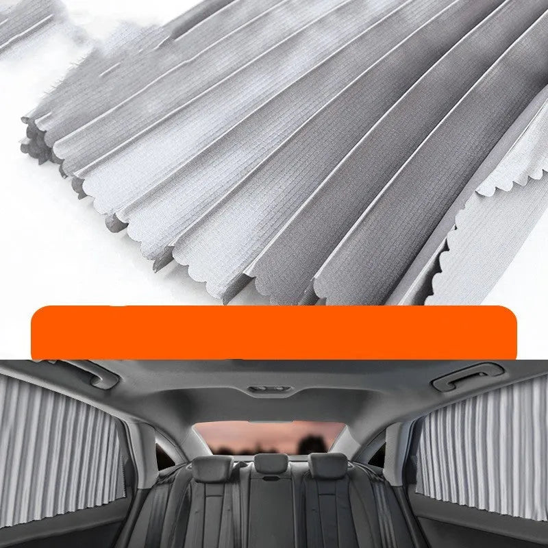 Retractable car sun curtain extended across windscreen with roller shutter mechanism visible.